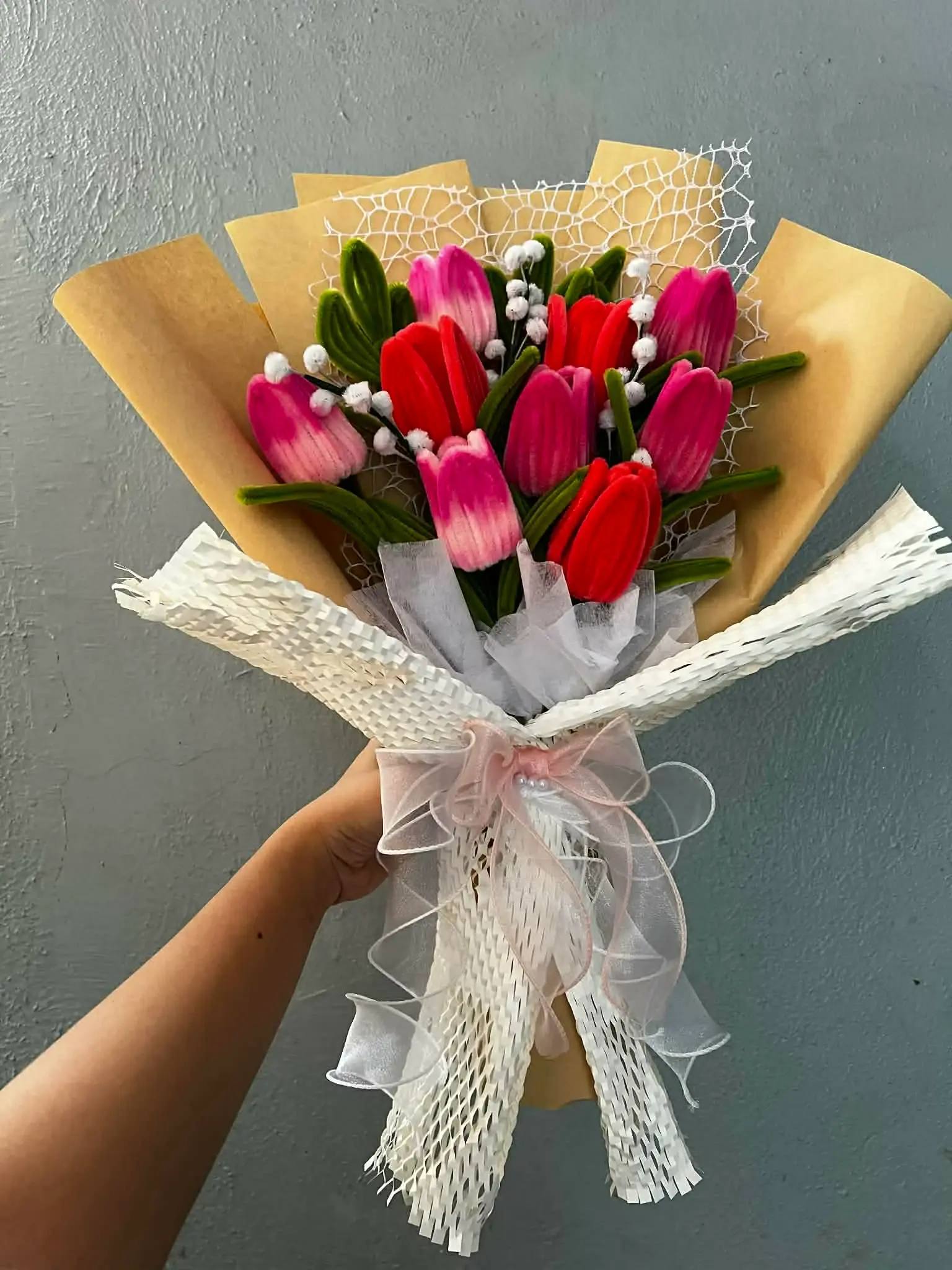 FleurKraft Mother's Day tulip bouquet â€” red and pink tulips with kraft paper wrapping